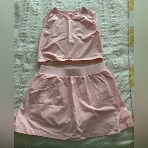 pink athletic set tank top and skirt size medium